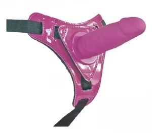 Розовый страпон на лакированных трусиках - 12 см.