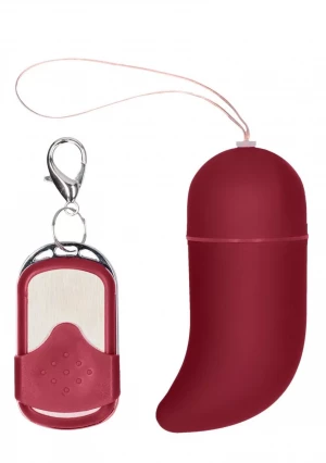 Красное виброяйцо Medium Wireless Vibrating G-Spot Egg с пультом - 7,5 см.